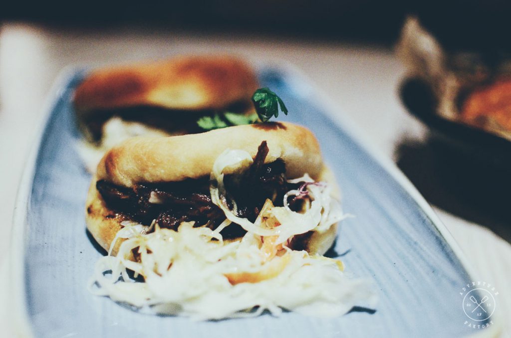 Oxtail Cocobread Sandwich - Pulled Oxtail, freshly baked cocobuns served with coleslaw